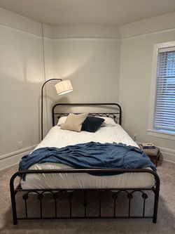 Queen metal bed frame with flower detail