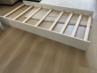 Twin trundle bed rolling white bed frame