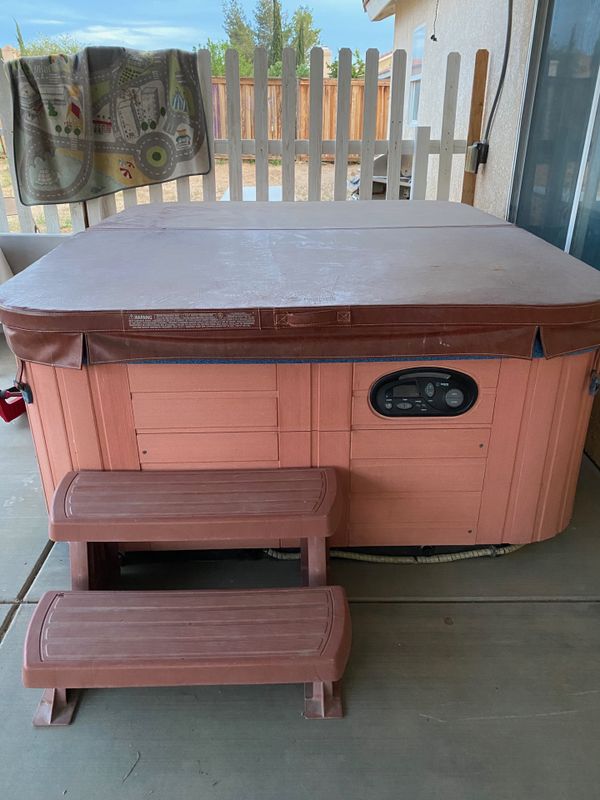 Hot Spring Portable Spa Fully Working Jacuzzi (7 ft x 7 ft) for Sale in