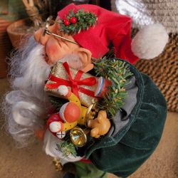 Very detailed Vintage Santa with bag of presents and Nice list