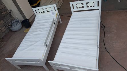 Two IKEA KRITTER Bed  with slatted bed base and mattrases , white, 27 1/2x63"