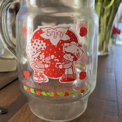No chips or cracks. Vintage 1980 Strawberry Shortcake 10” Glass Lemonade Pitcher. Condition is "Used"