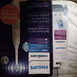 Phillips Sonic Care Tooth Brush With Replacement Heads