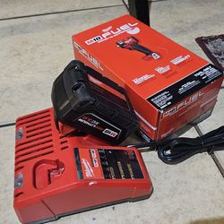 New Milwaukee  impact battery & charger