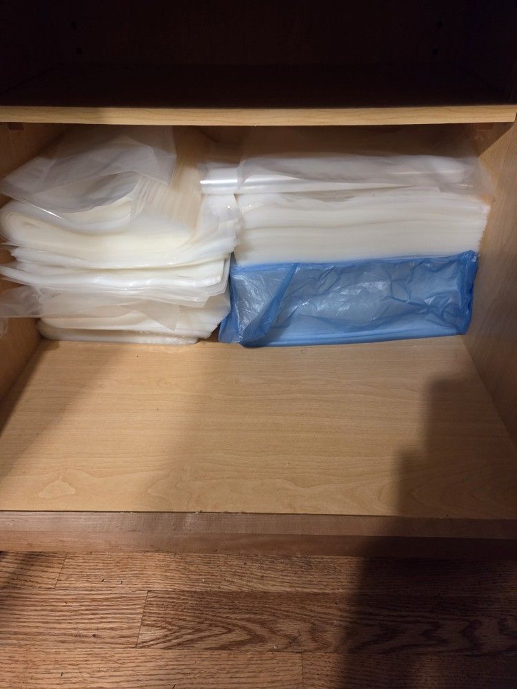 A Ridiculous Amount Of Various Sized Vacuum Seal Bags