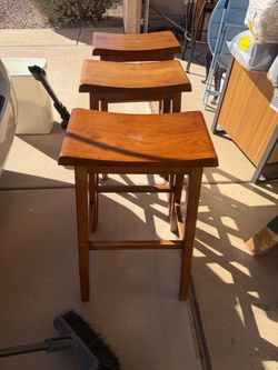 3 tall wood brown stools