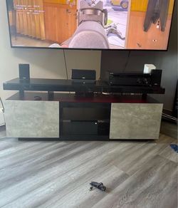 70 Inch LED TV Stand with Power Outlets, and  LED Light.  Gray and black
