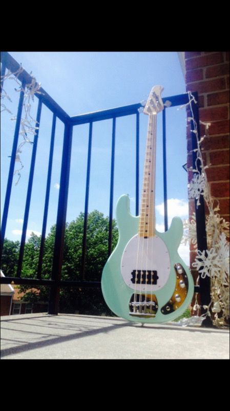 Bass guitar- Sterling by Musicman SUB Ray 4 Bass in Mint Green