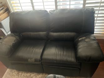Reclining love seat/ leather