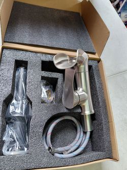 Forious pro single handle Waterfall style bathroom sink faucet with drain in brushed nickel