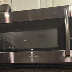 Samsung Microwace above stove 
