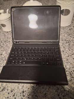 Multi function keyboard with touchpad