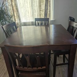 Dining table , four chairs 