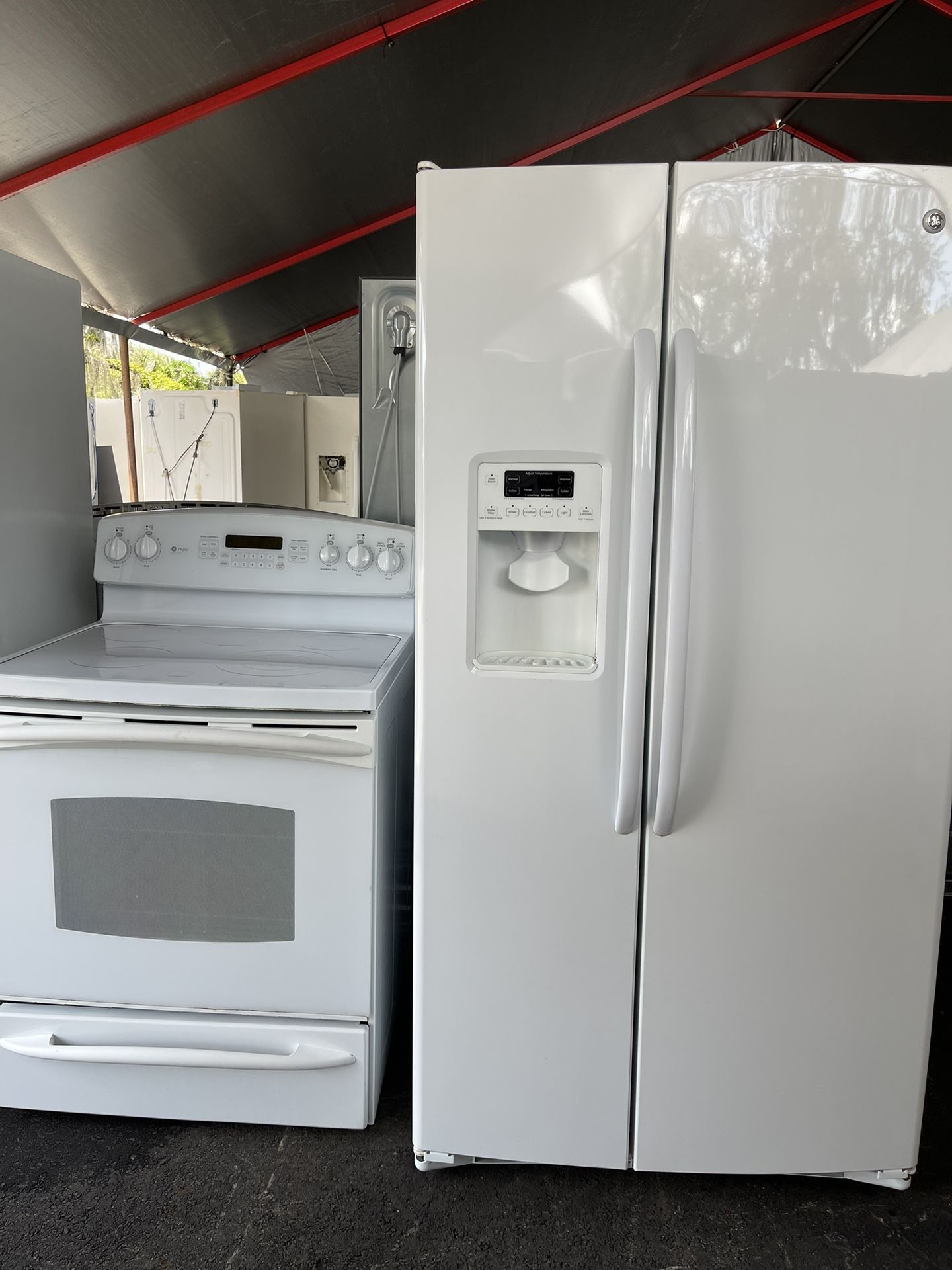 GE Side By Side Refrigerator With GE Stove