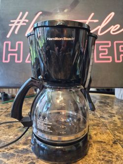 Hamilton Beach 12 Cup Coffee Maker Glass Carafe  Black 

The Hamilton Beach 12 Cup Coffee Maker with Glass Carafe is a drip coffee maker that can brew