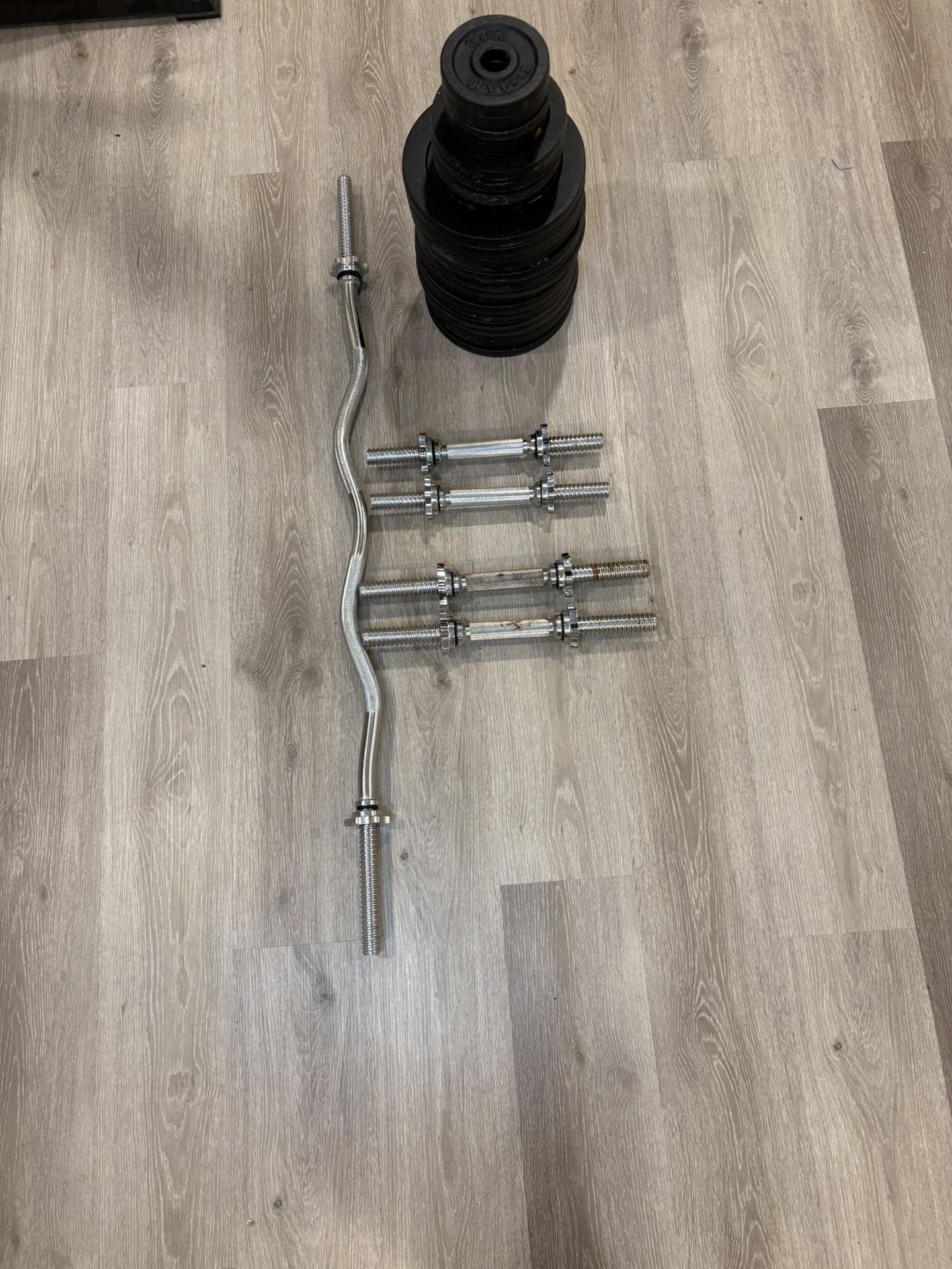 EZ Curl Bar + 4 Dumbbell Handles + 210 lb Weight Plates