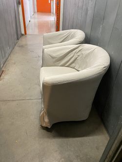 Two Chairs With slip Covers 