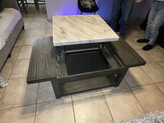Ashley Furniture Rising Coffee Table And Matching End Table