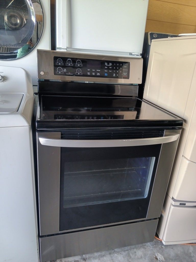 L/G Glass Top Stove Stainless Steel Everything Works Good 