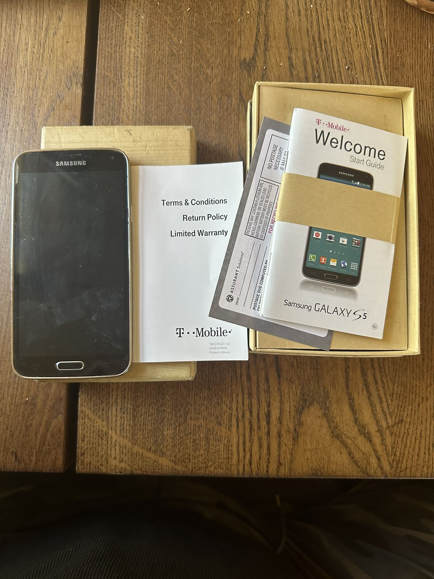 SAMSUNG GALAXY S5 SM-G900T Cellphone T-Mobile Locked