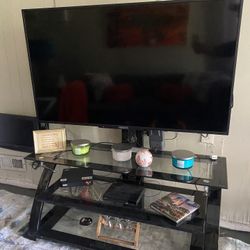 55” Hitachi Flat Screen & Entertainment Center 