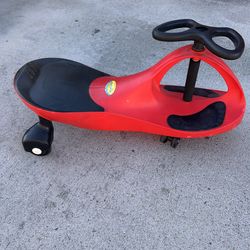 Wiggle Car - Ride on Toy for Ages 3 and Up - Toddler Ride on Toys with no Batteries, Gears, or Pedals Just Twist, Wiggle, and Go by Lil’ Rider (Red)