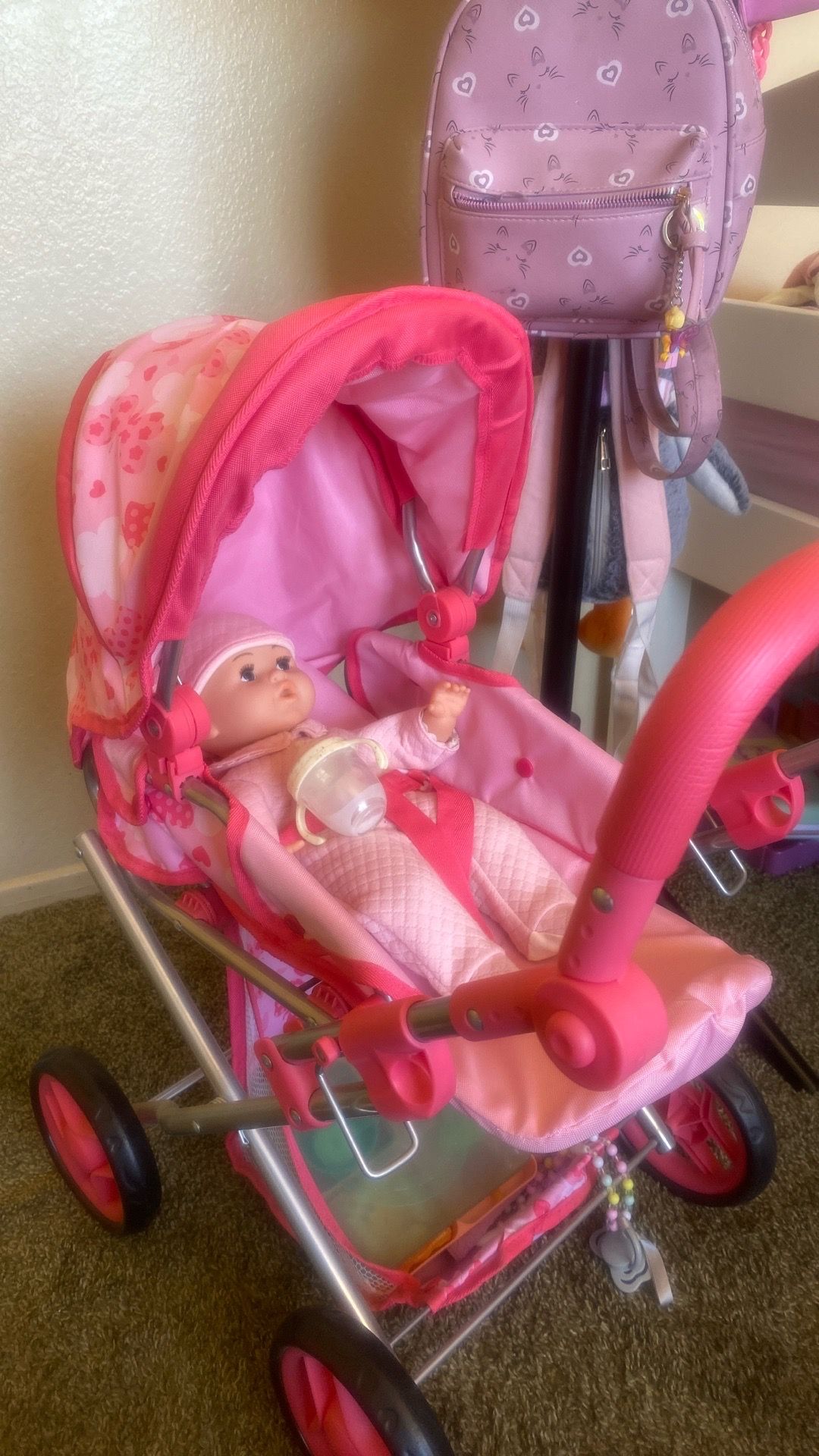 Doll with stroller