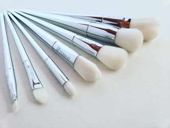new. silver color makeup brush set