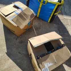 3 Boxes Of Clothing