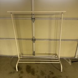 Small metal clothing wrack with wheels