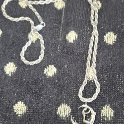 sterling silver "Moon Rider" pendant on a rope chain. 