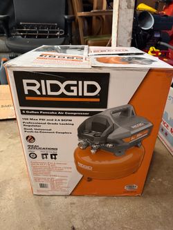 Ridgid 6 gallon air compressor with Hose