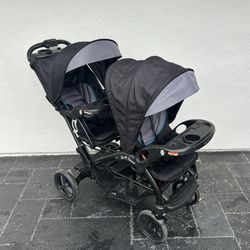 PRACTICALLY NEW BABY TREND SIT AND STAND DOUBLE STROLLER!!