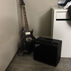 Mitchell Electric Guitar and Fender Speaker