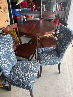 Solid hard wood Table with 4 chairs like new condition no scratches