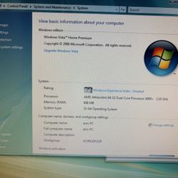 Computer Desktop And Wood Desk