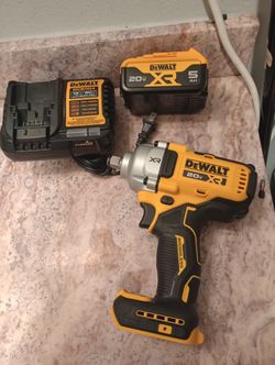 New Dewhalt 1/2" Impact Wrench with Battery and Charger - Firm Price 