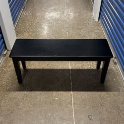 black low coffee table or tv stand or dining bench