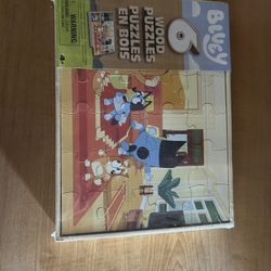 set of six wooden jigsaw puzzles featuring characters from the children's show bluey