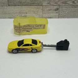 Vintage BKC IRWN Toy Yellow ‘2000 Ford Mustang GT / Spring Powered Go With Key • Plastic Car and Key • Made in China 