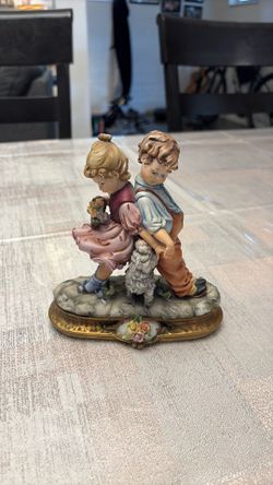 Vintage Porcelain Statue