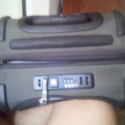 Tumi Locking Suitcase