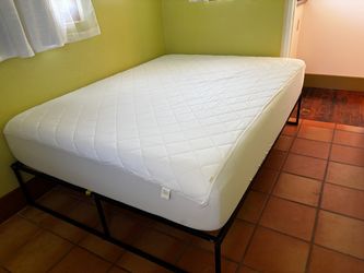 Queen sized memory foam mattress and bed frame