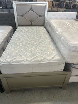 Twin size mattress and box springs and bed