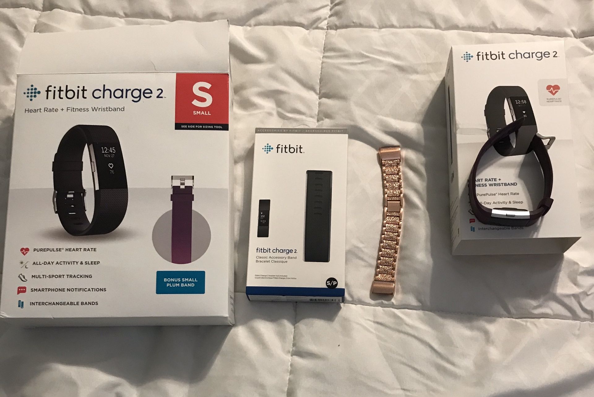 Fitbit Charge 2 with 3 bands. Purple. Black and Rose Gold.