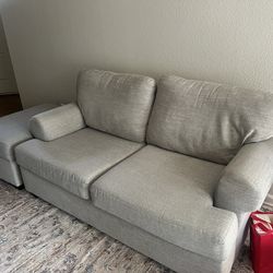 Living Spaces Dove Grey Loveseat & Storage Ottoman and Dark Grey Recliner