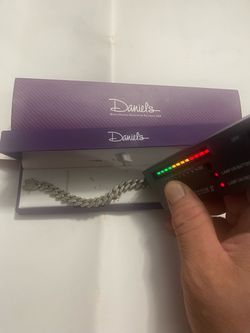 Selling a silver slave bracelet with 140 diamonds, measuring 9” in length, I paid 725, I’m only asking for 380, the price is firm.