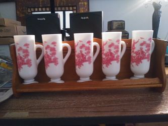 Vontage 5 avon milk glasses with a wooden shalve !!