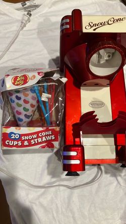 Small plug in snow cone machine with cups and spoon-straws