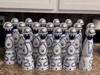 Empty clase azul bottles